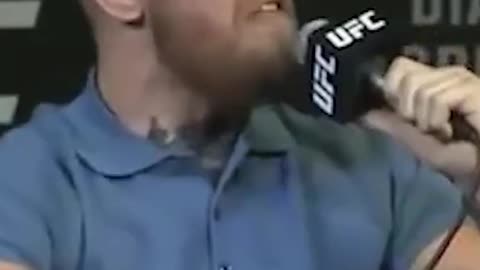 Conor McGregor throws bottle at himself