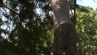 Man Narrowly Avoids Tree Trimming Fiasco