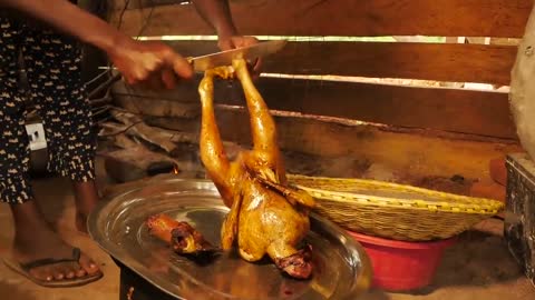 Traditional way of cooking chicken mixed with peanut butter in Africa//Village life