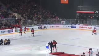 Hockey Game Guest Falls After Puck Drop