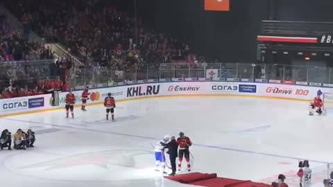 Hockey Game Guest Falls After Puck Drop