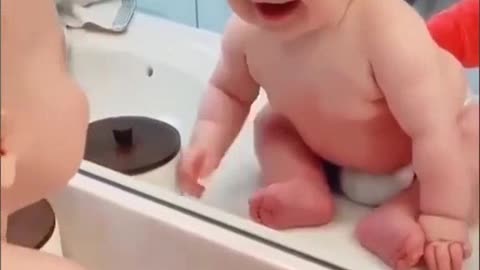 Beautiful baby laughs