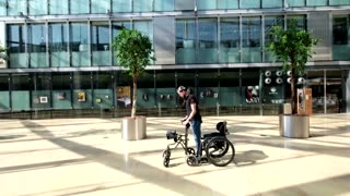 Paralyzed man walks again with brain-spine device