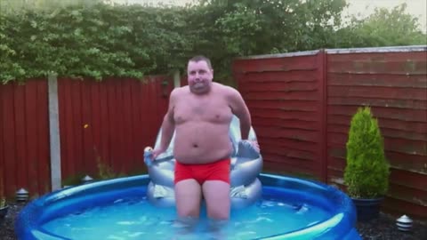 Big man in little bathing suit fails in little pool