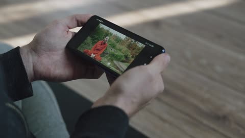 Man Watching Online Yoga Lessons