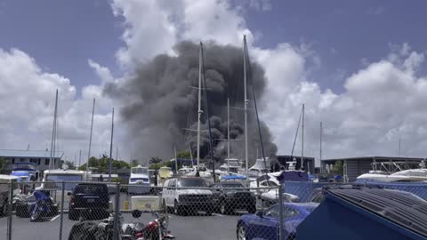 Boat Fire Billows Black Smoke Into Sky