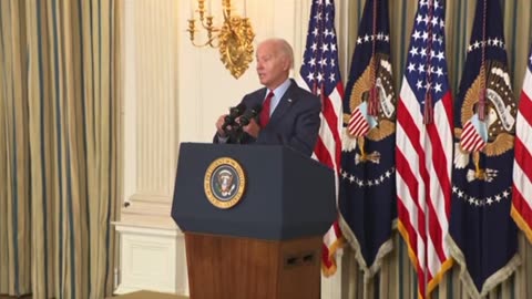 Biden says he has to keep wearing a mask, and says "But don't tell 'em I didn't have it on when I walked in."