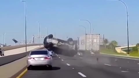 Idiot Driver Sends Car Flying Across Highway