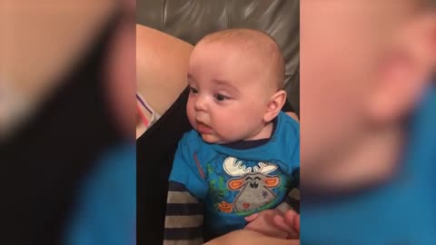 Baby Laughs At First Bites of Solid Food
