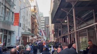 NY fire and rescue crews respond to deadly scene of parking garage collapse