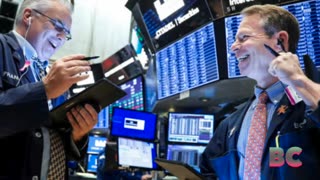 Dow rises more than 200 points, touches new record above 40,000