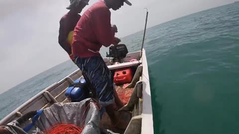 fishing in the waters of the Malacca Strait, Indonesia