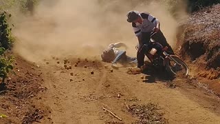 Guy Carrying Large Bag of Oranges Falls of the Back of Bike