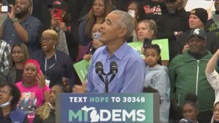 Obama trying to get the crowd to pay attention to him after getting heckled