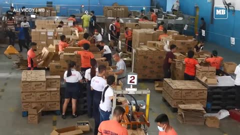 Several government offices leads the repacking of food packs for the victims of Typhoon Paeng