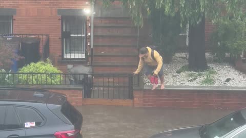 Dedicated Worker Makes Commute In Flooded New York City