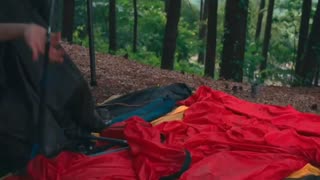 Camping alone in the wilderness to relax in the rain