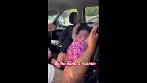 Baby's new routine is to stretch after getting out of car seat