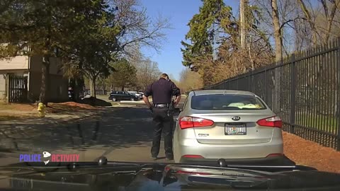 Michigan Cop Shatters Car Window After Driver Refuses To Give ID