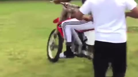 dude learning to ride motorbike takes off out of control
