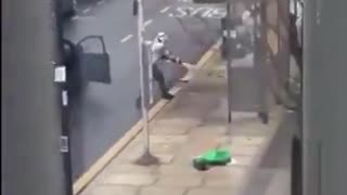 A British man removes a Palestinian flag in London causing a ladder fight