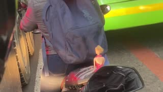 Motorcyclist Gives Barbie a Lift