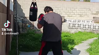Prolast 15 Pound Punching Bag Workout Part 1. Practicing Hard Left Hooks!