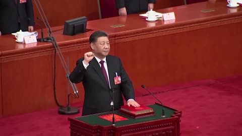 President Xi Jinping secures unprecedented third term in China