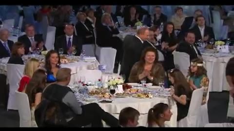 Vladimir Putin. Charity ball at the Ice Palace. Presenter Elena Sever.