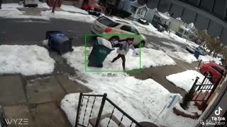 Angry Neighbor Slips While Pushing Over Trash Cans
