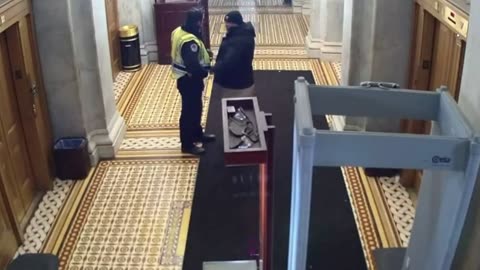 Footage Shows Capitol Officers Uncuffing J6 Protester, Giving Fist Bump Before Releasing Him