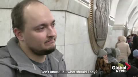 “Don’t attack us:” Ukrainians shelter in metro station amid Russian attack on Kyiv