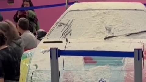 Climate activists throw flour at Andy Warhol car in Italy