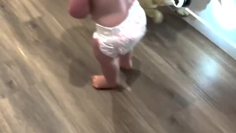 Adorable Baby Laughs Hysterically as Dog Chases flash light