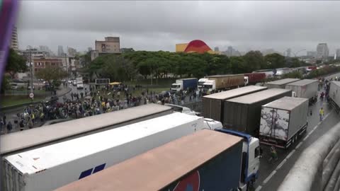 Brazilian police fire water cannons and rubber bullets at anti Lula protesters