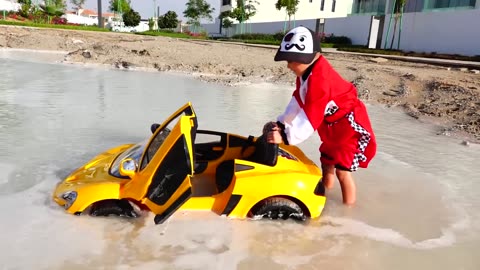 Nikita ride on children's car and stuck in a puddle !!! Please Subscribe