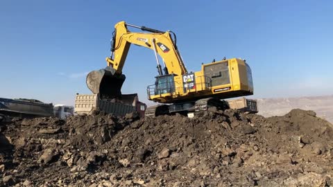 Caterpillar 6015B Excavator Loading Trucks With Two Passes - Sotiriadis Mining Works