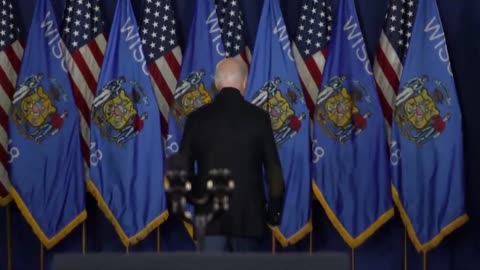 Biden Handler Pops Out From Behind The Curtains When Joe Got Confused At The End Of His Speech