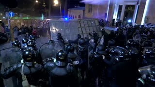 Protesters clash with police by Georgia parliament