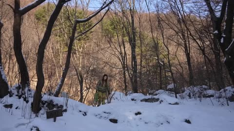 Snowy Frozen wild forest floor alone Camping / Hot Tent in the cold