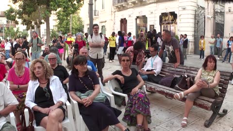 Protesters serve humble dinner as G7 leaders attend banquet