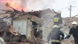 Ukrainian firefighters extinguish fire after Russian strike in Dnipro