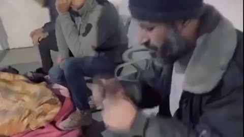 A Palestinian grandfather bids farewell to his grandchildren