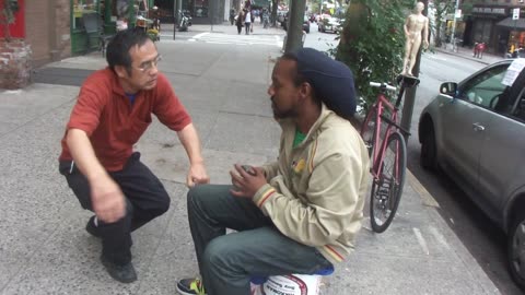 Luodong Massages Dread Lock Man On Sidewalk