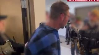 Arrest video of Crumbley parents