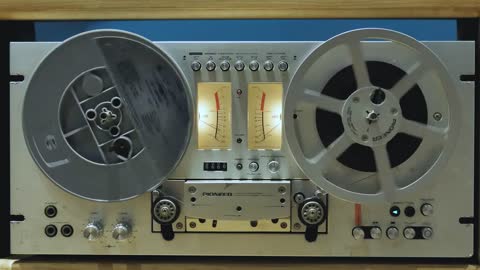 Audio tape recorder in playing motion