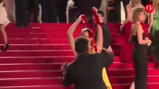 Ukrainian woman was rudely hauled away from red carpet during Cannes Festival