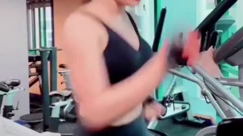 Beautiful girl on treadmill