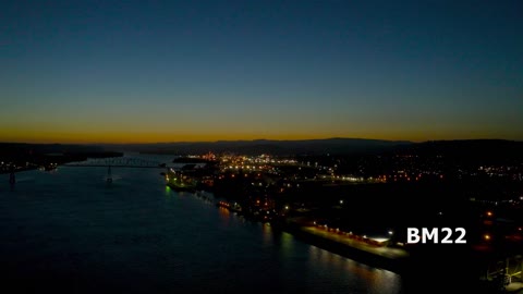Flying Over Columbia River At Dusk