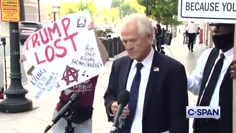 Ex-Trump aide Peter Navarro interrupted by heckler again